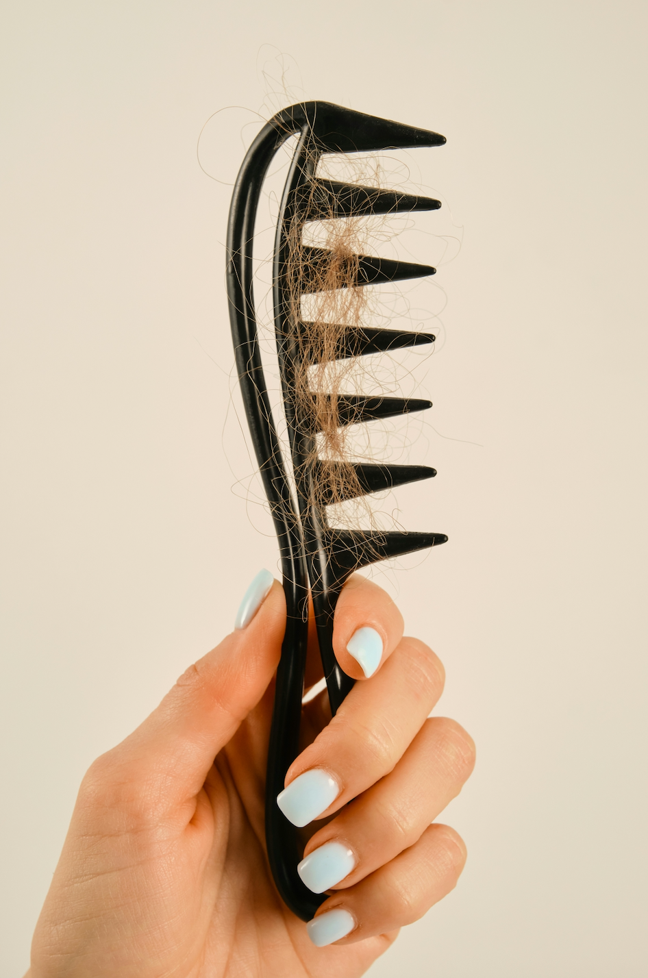 Postpartum Hair Loss: Why It Happens & How to Support Hair Regrowth After Birth