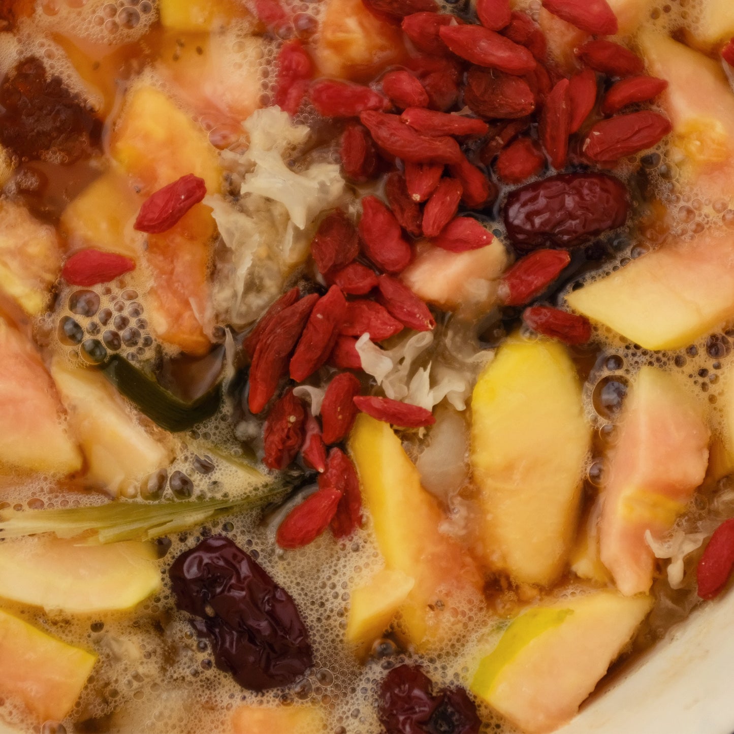 herbal dessert consisting of goji berries, papaya, red dates jujube, snow fungus, peach gum